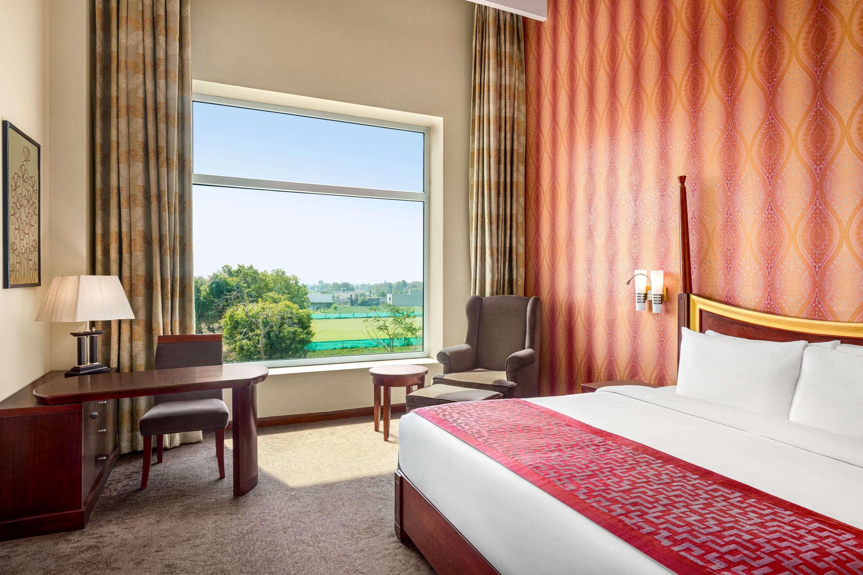 Hotel Ramada By Wyndham Jaipur Jaisinghpura Esterno foto